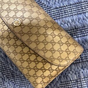 Gucci wallet deep gold brown color